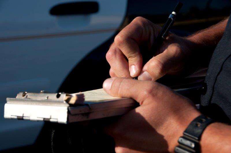 Deputy writing citation